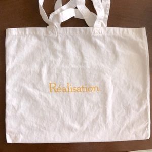 Realisation Par Canvas Tote with Yellow Text